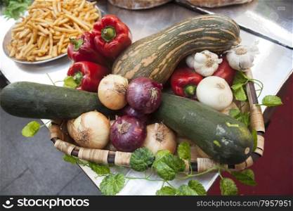 Bread, fresh vegetables zucchini garlic bell pepper onion, at the fair in Spain.