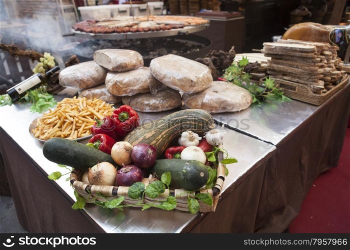 Bread, fresh vegetables zucchini garlic bell pepper onion, at the fair in Spain.