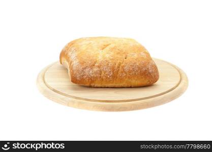 bread on a cutting board isolated on white