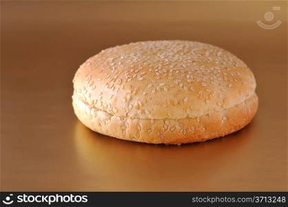 bread roll from wheat flour lies on plate