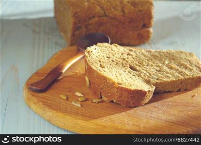 Bread slice Organic food homemade wholegrain healthy nutrition. Rustical bread oldstyle eating. Tasty baker meal closeup.