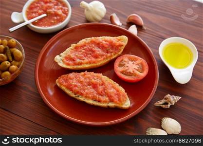 Bread toasted slices with grated tomato Catalonia style pan tomaquet