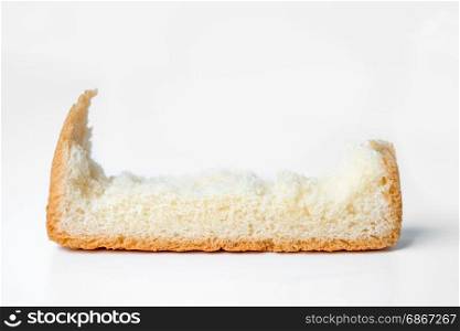 bread torn on white background