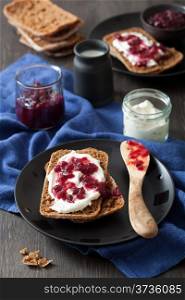 bread with creme fraiche and lingonberry jam