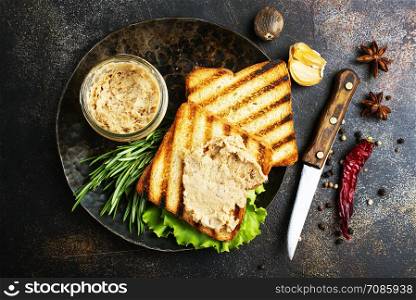 bread with liver pate on plate, delicious poultry liver pate