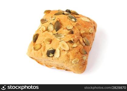 Bread with pumpkin seeds isolated on white background.