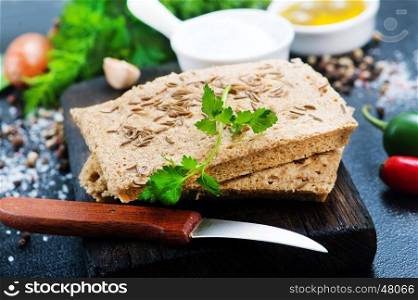 bread with spice on the wooden board