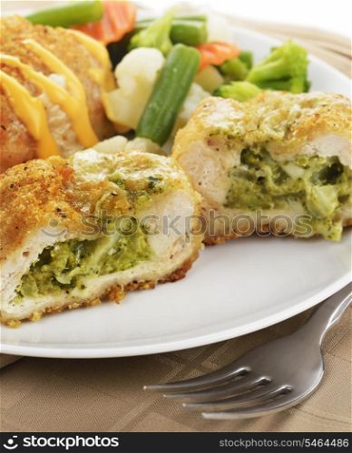 Breaded Chicken Breasts Stuffed With Broccoli And Cheese