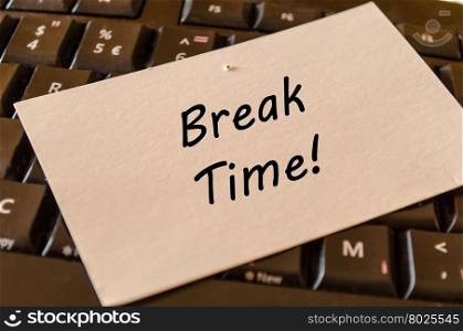 Break time concept on black keyboard background
