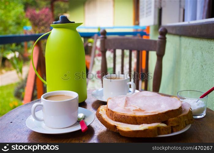 breakfast at the terrace of little house at tropical forest