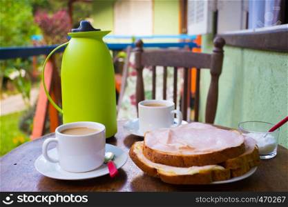 breakfast at the terrace of little house at tropical forest