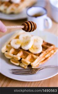 breakfast - Belgian waffles with bananas and honey