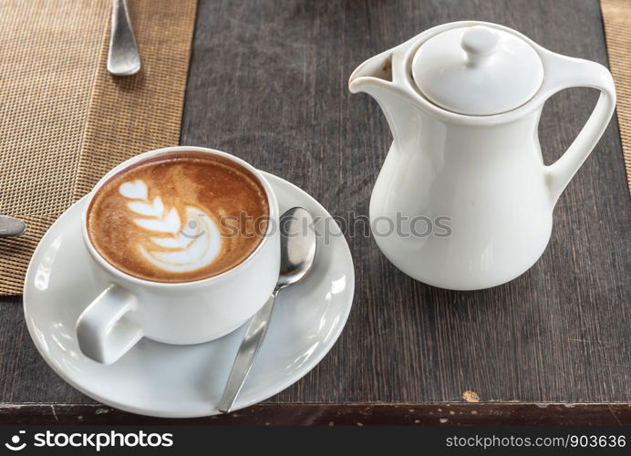 Breakfast coffee set in a white glass