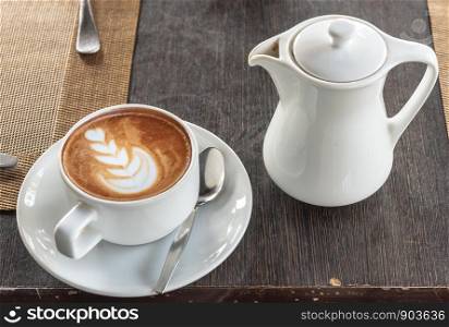 Breakfast coffee set in a white glass