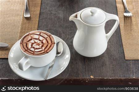 Breakfast coffee set in a white glass