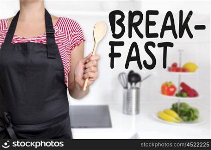 Breakfast cook holding wooden spoon concept. Breakfast cook holding wooden spoon concept.
