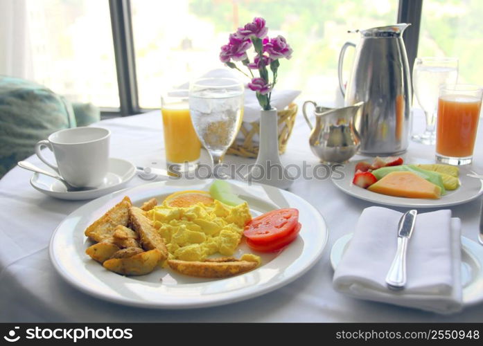 Breakfast for two served in a hotel room