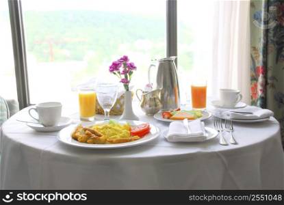 Breakfast for two served in a hotel room