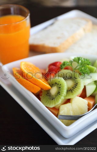 breakfast fruit bread and orage juice