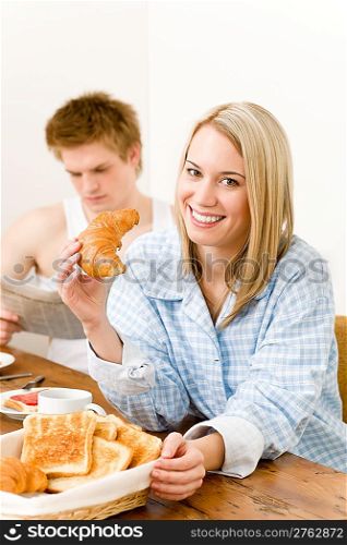 Breakfast happy couple enjoy romantic morning eat croissant