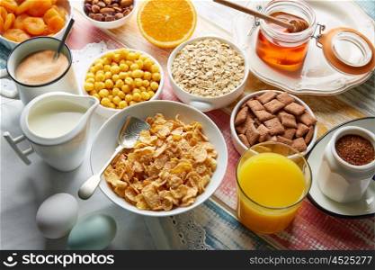 Breakfast healthy cereal coffee and orange juice and eggs