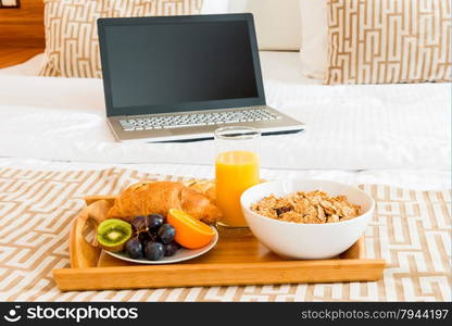 Breakfast in bed and a laptop in the room