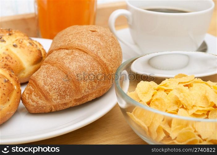Breakfast in Bed - Corn Flakes, Coffee, Croissant, Orange Juice, Coffee and Rolls