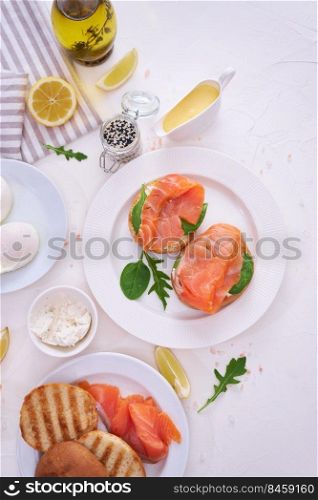Breakfast Ingredients - Smoked salmon, poached egg and grilled buns.. Breakfast Ingredients - Smoked salmon, poached egg and grilled buns