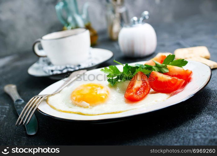 breakfast on plate, fried eggs with vegetables