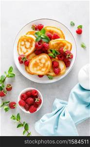 Breakfast pancakes with fresh raspberry