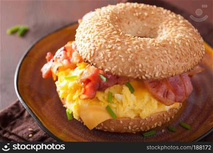 breakfast sandwich on bagel with egg bacon cheese