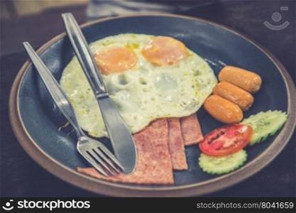 Breakfast - Sausage, eggs, ham (Vintage filter effect used)