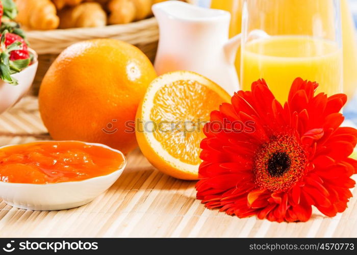 Breakfast with assortment of pastries, coffees and fresh strawberries