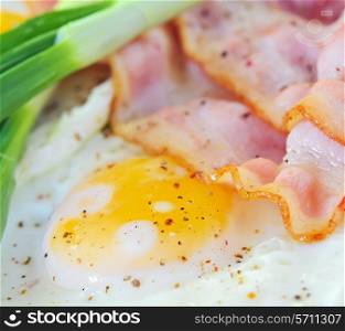 breakfast with bacon and fried eggs, macro