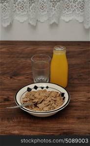 Breakfast with cereal and orange juice