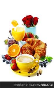 Breakfast with croissants, coffee and orange juice