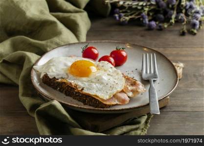 breakfast with egg bacon tomatoes high angle. High resolution photo. breakfast with egg bacon tomatoes high angle. High quality photo