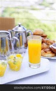 Breakfast with orange juice coffe tea milk