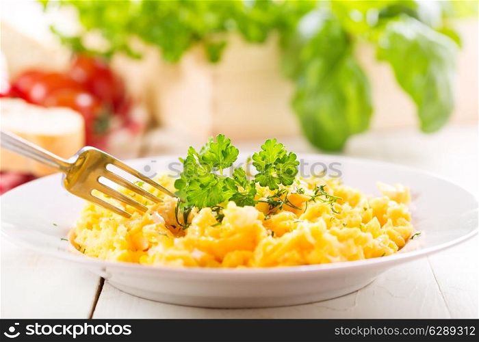 breakfast with plate of scrambled eggs