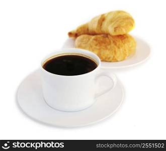 Breaksfast of black coffee and fresh croissants isolated on white background