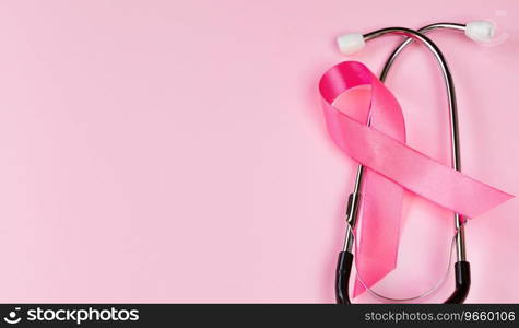 Breast Cancer Awareness Month. Pink ribbon and stethoscope on colored background. Women’s health care concept. Symbol of fight against oncology. Copy space.. Breast Cancer Awareness Month. Pink ribbon and stethoscope on colored background. Women’s health care concept. Symbol of fight against oncology. 