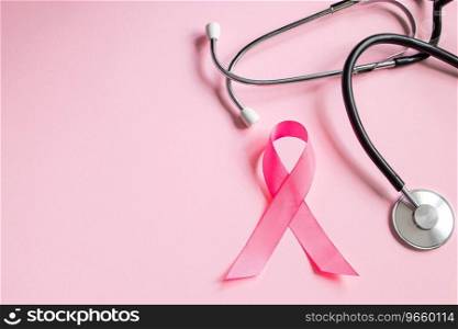 Breast Cancer Awareness Month. Pink ribbon and stethoscope on colored background. Women’s health care concept. Symbol of fight against oncology. Copy space.. Breast Cancer Awareness Month. Pink ribbon and stethoscope on colored background. Women’s health care concept. Symbol of fight against oncology. 