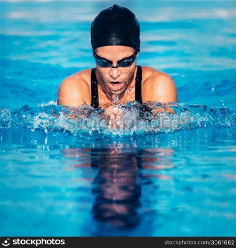 Breaststroke swimmer in the pool
