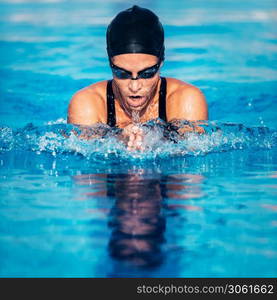 Breaststroke swimmer in the pool