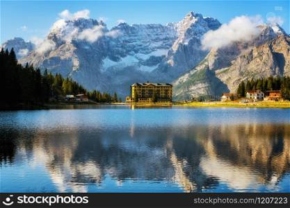 Breathtaking landscape of Lake Misurina with Dolomites mountain in background, Italy. Panoramic nature landscape of travel destination in Eastern Dolomites in Italy.