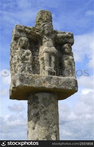 Breton stone cross near Tumulus Saint-Michel church in Carnac, South Brittany, France