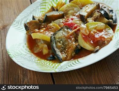 Briami - Greek Ratatouille.Baked Vegetables with eggplant, paprika and tomato.