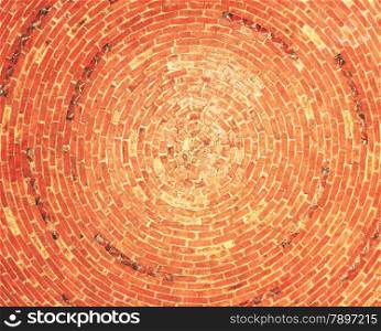 Brick dome inside. Dome is made of red brick. Circular brickwork.