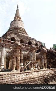 Brick elephants and stupa in wat Chang Lom, Si Satchanalai, Thailand