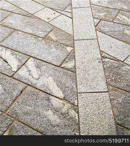 brick in legnano street lombardy italy varese abstract pavement of a curch and marble
